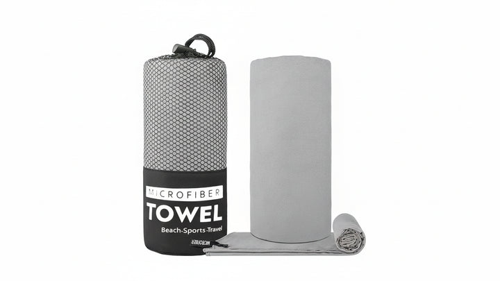 Gray microfiber towel with packaging on a white background