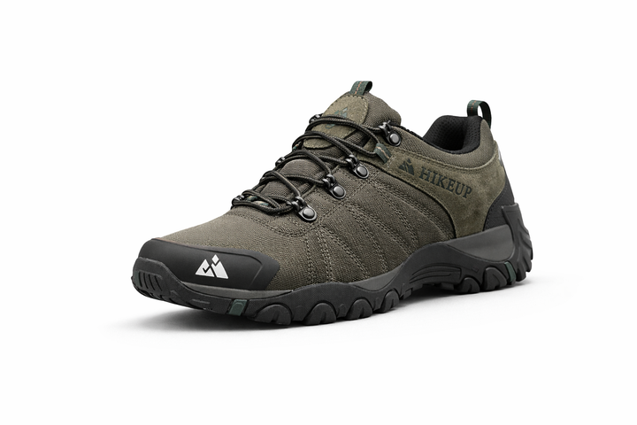 Green hiking shoe with brand logo on a white background